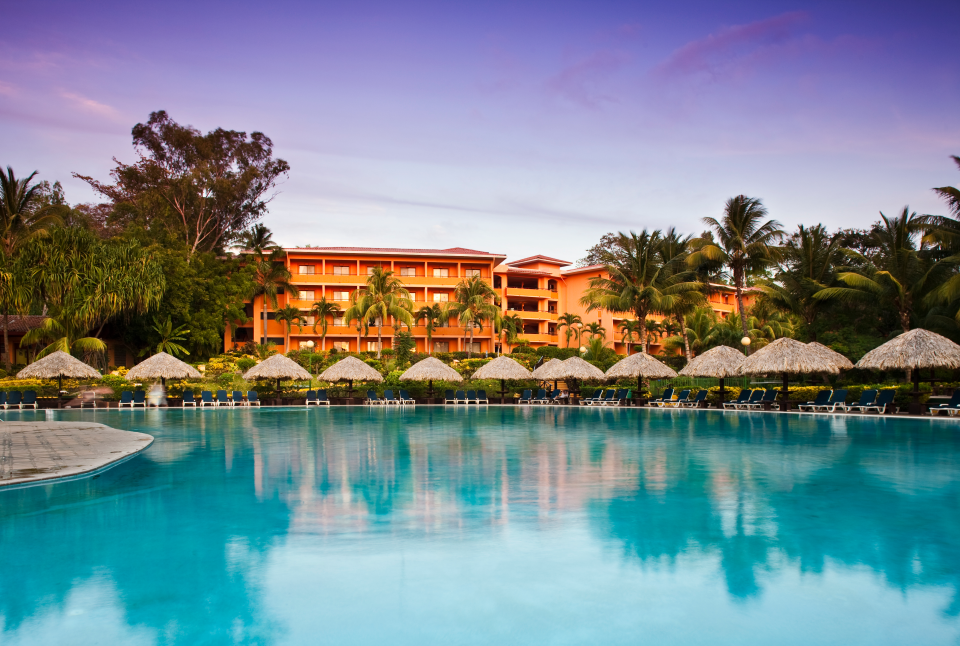 A teal pool at Barcelo Montelimar Nicaragua with Voyages Aqua Terra A teal pool at Barcelo Montelimar Nicaragua with Voyages Aqua Terra