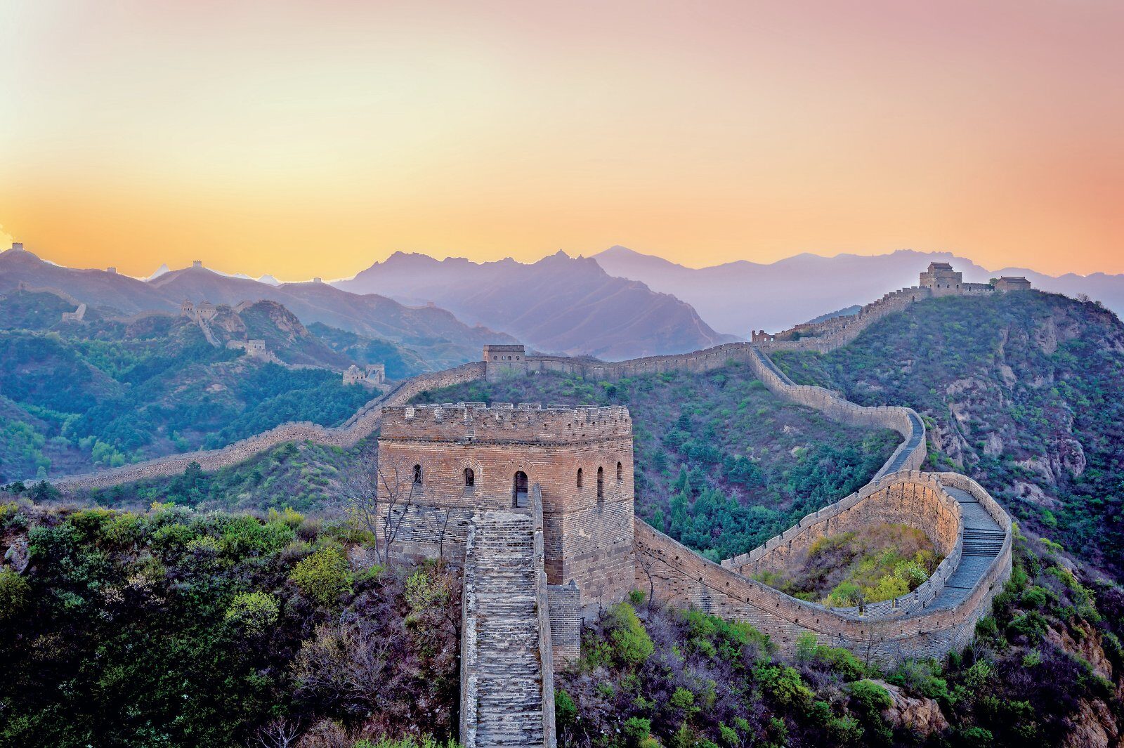 La Grande Muraille de Chine au coucher du soleil