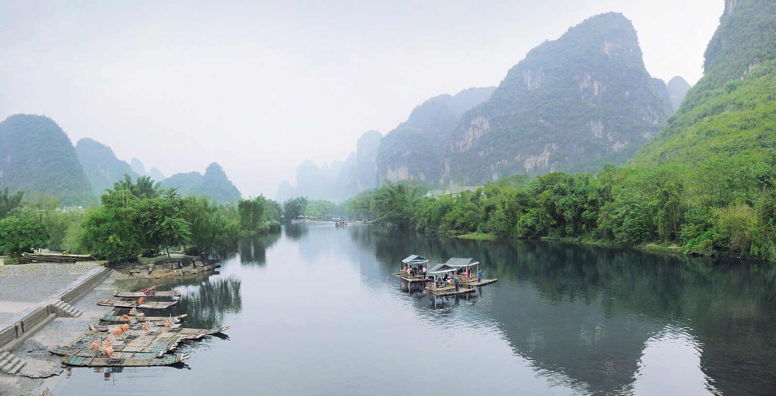 River and karst peaks in the mist in China River and karst peaks in the mist in China