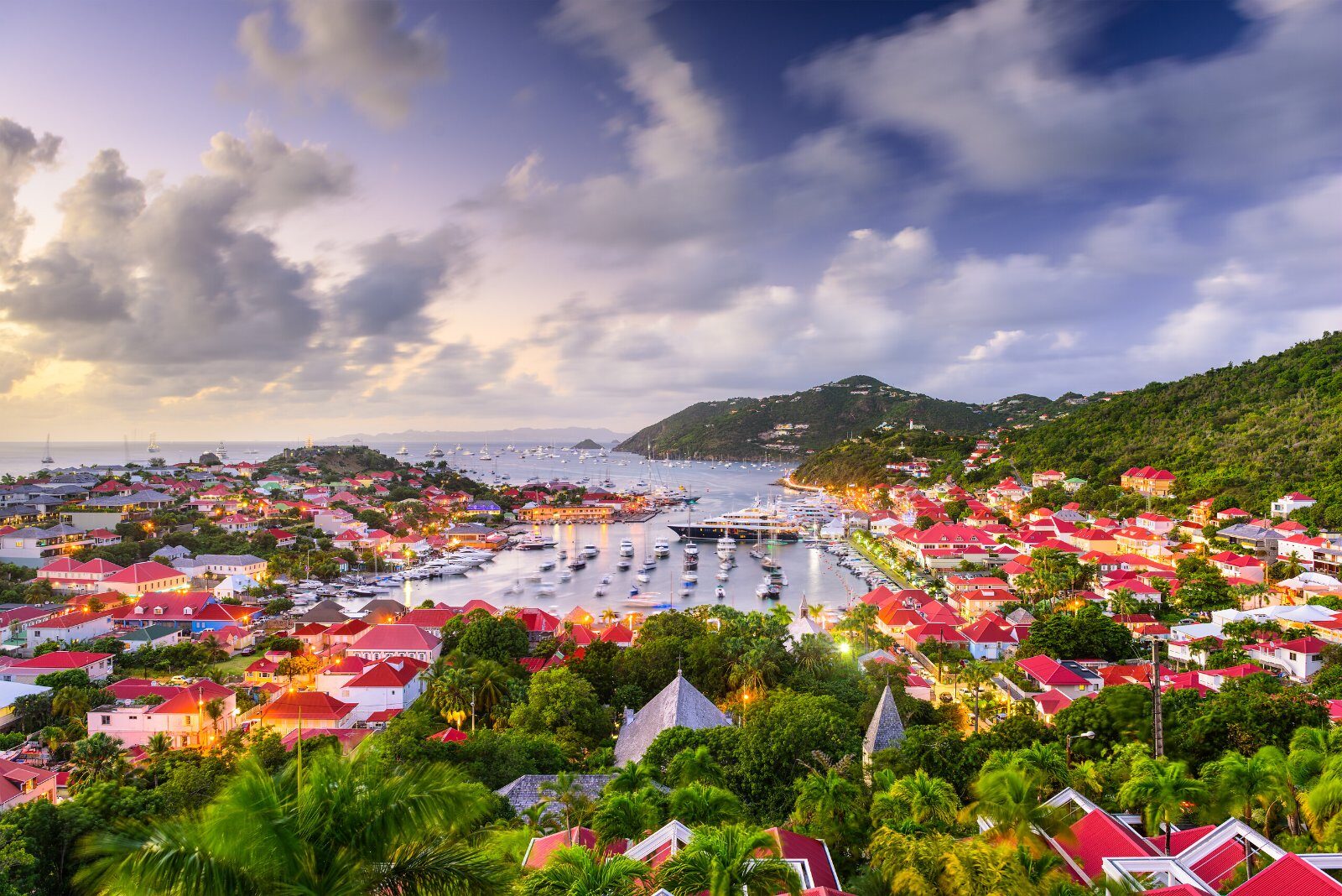 Red-roofed village around a bay in the Antilles