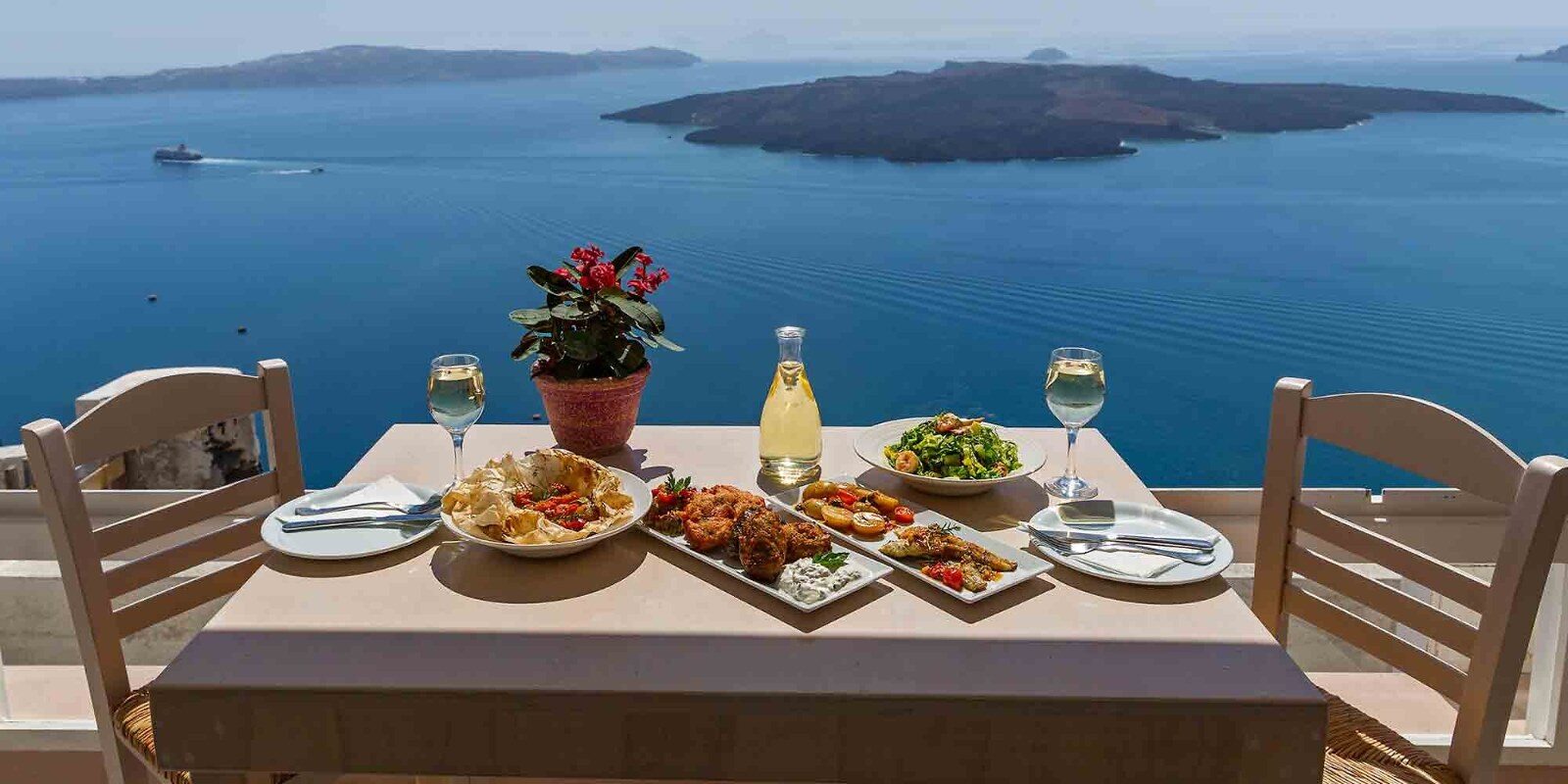 A table for two overlooking the Aegean Sea