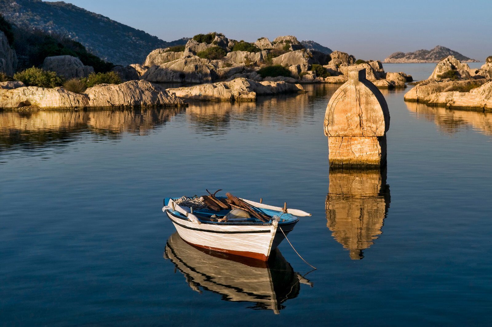 Lycian tomb rising from the water on the Turkish coast
