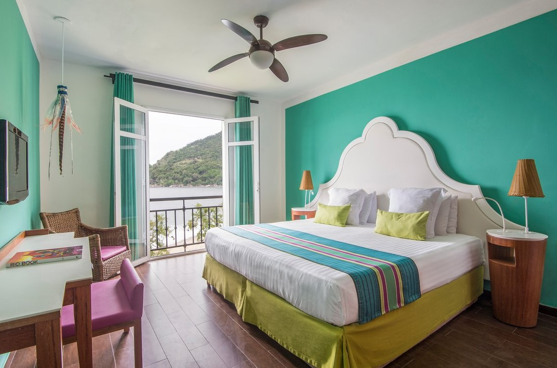 Superior room at Club Med Rio Das Pedras, decorated with Creole-inspired design and overlooking gardens or mountains.