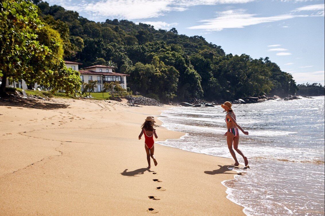 Mother and child on the beach at Club Med Rio das Pedras Mother and child on the beach at Club Med Rio das Pedras