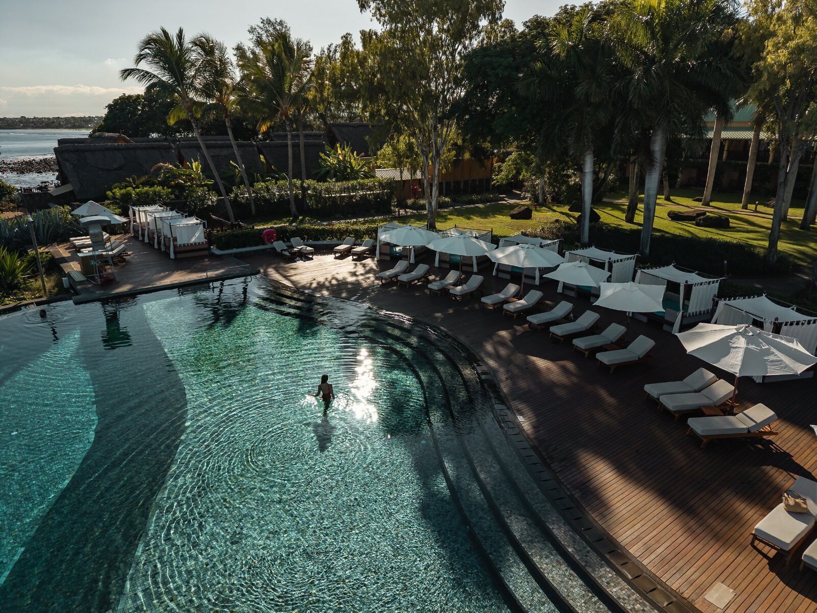 Palm-fringed hotel pool on Reunion Island