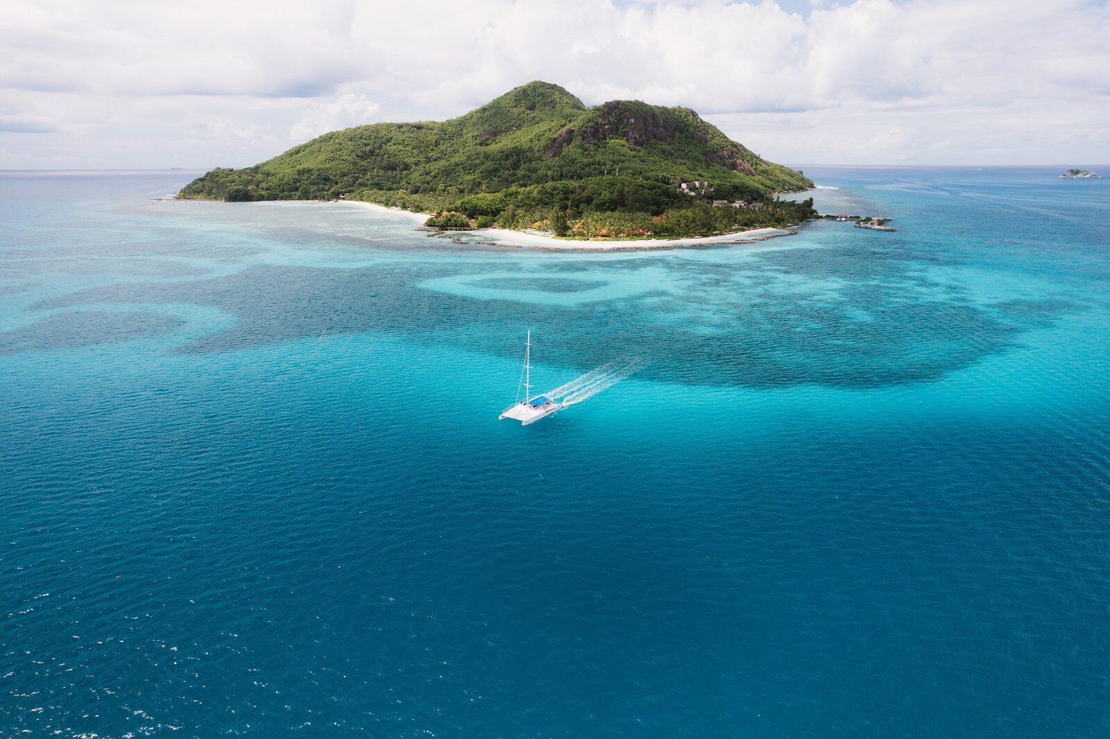 Small island surrounded by turquoise water, Seychelles