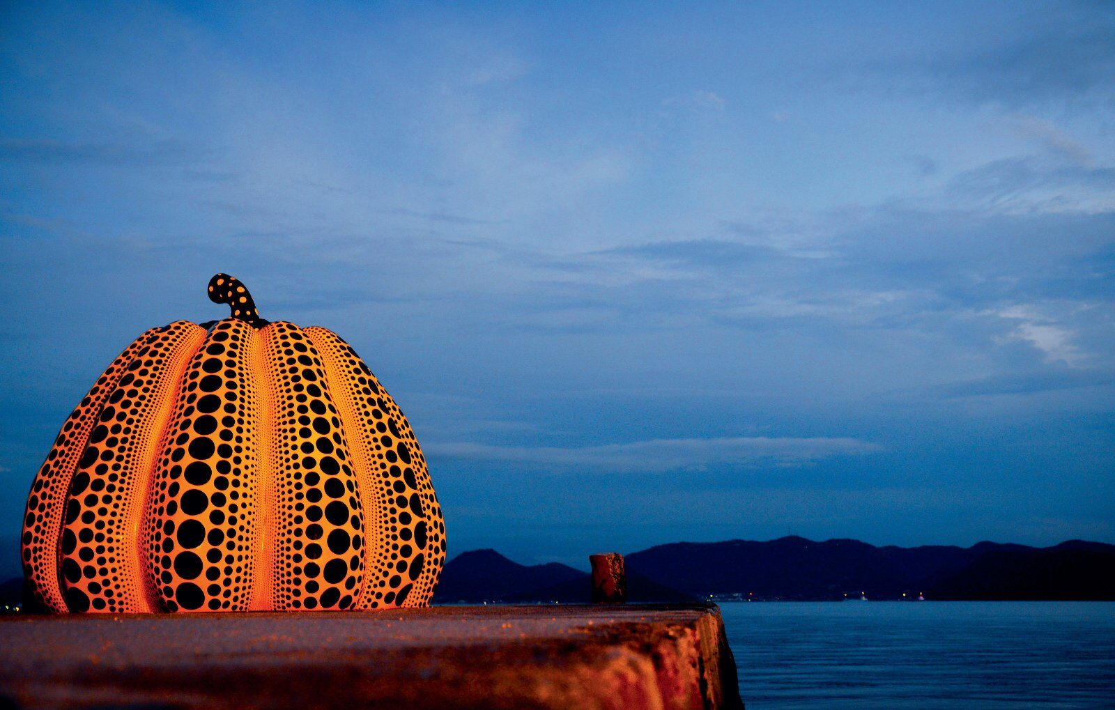 Giant pumpkin on the pier of Naoshima island