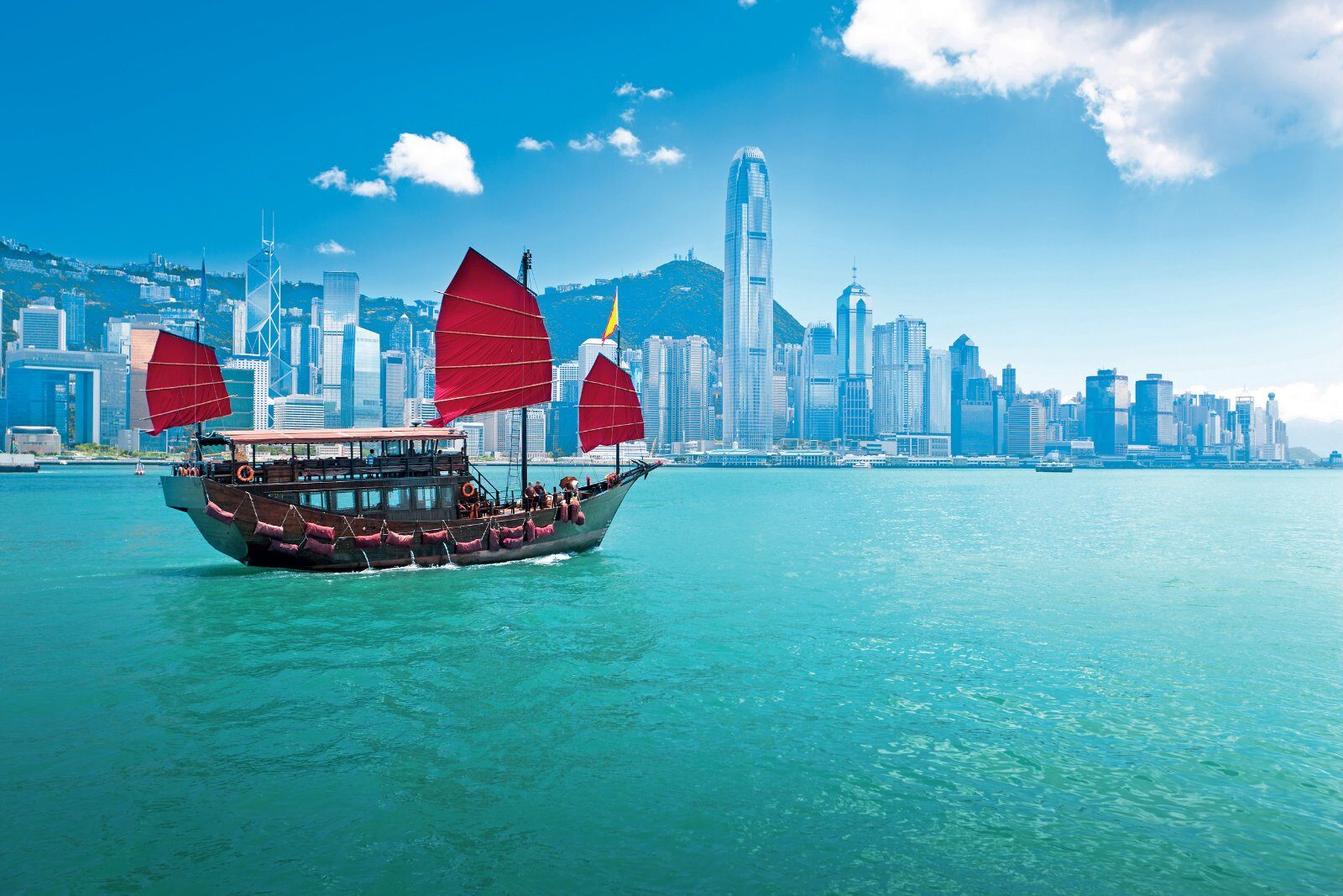 Red-sailed junk in Hong Kong harbour
