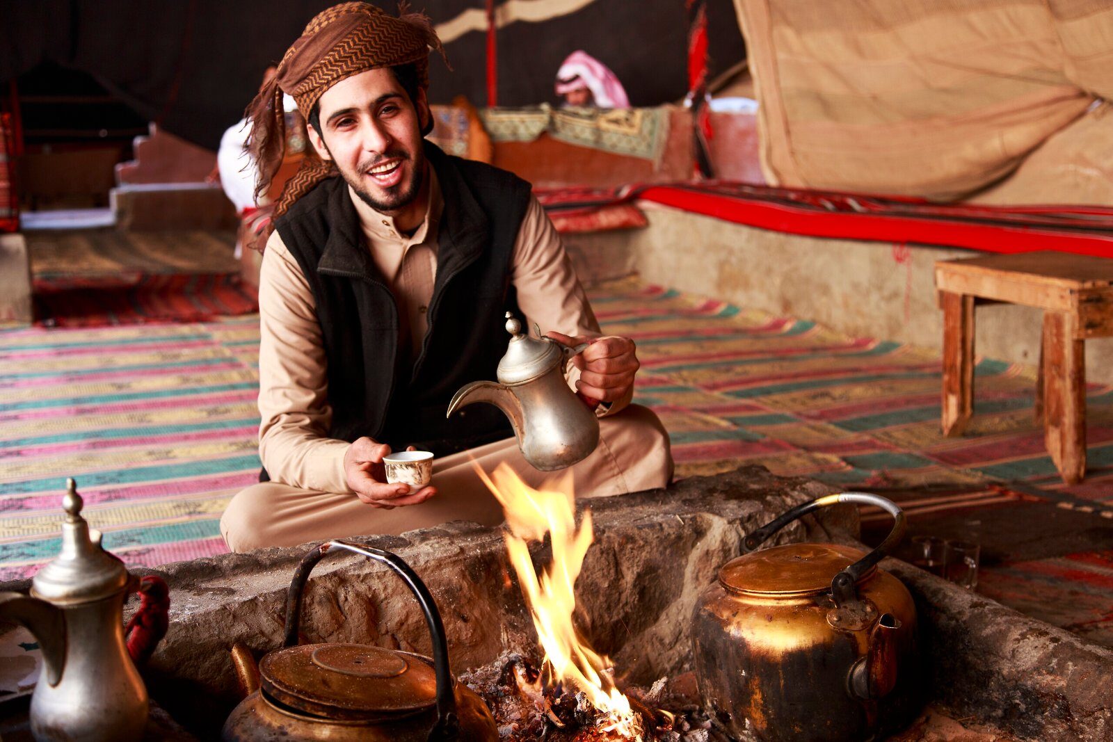 Bedouin preparing tea by the fire