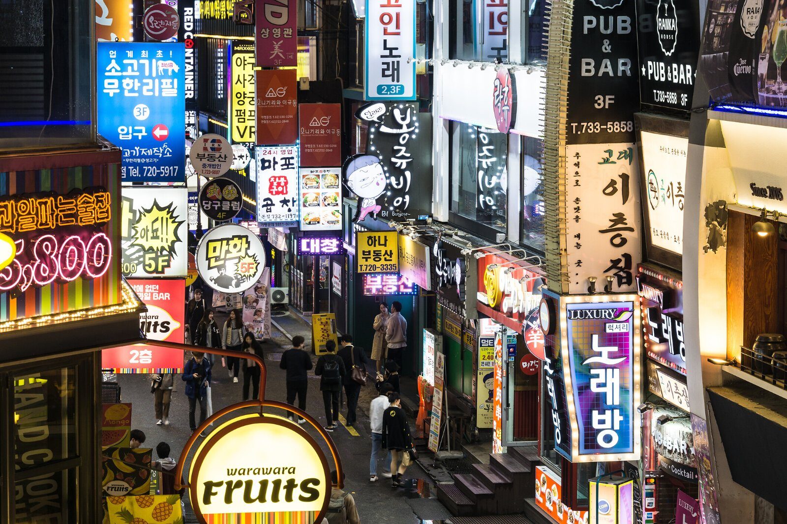 Busy street with neon signs in Seoul