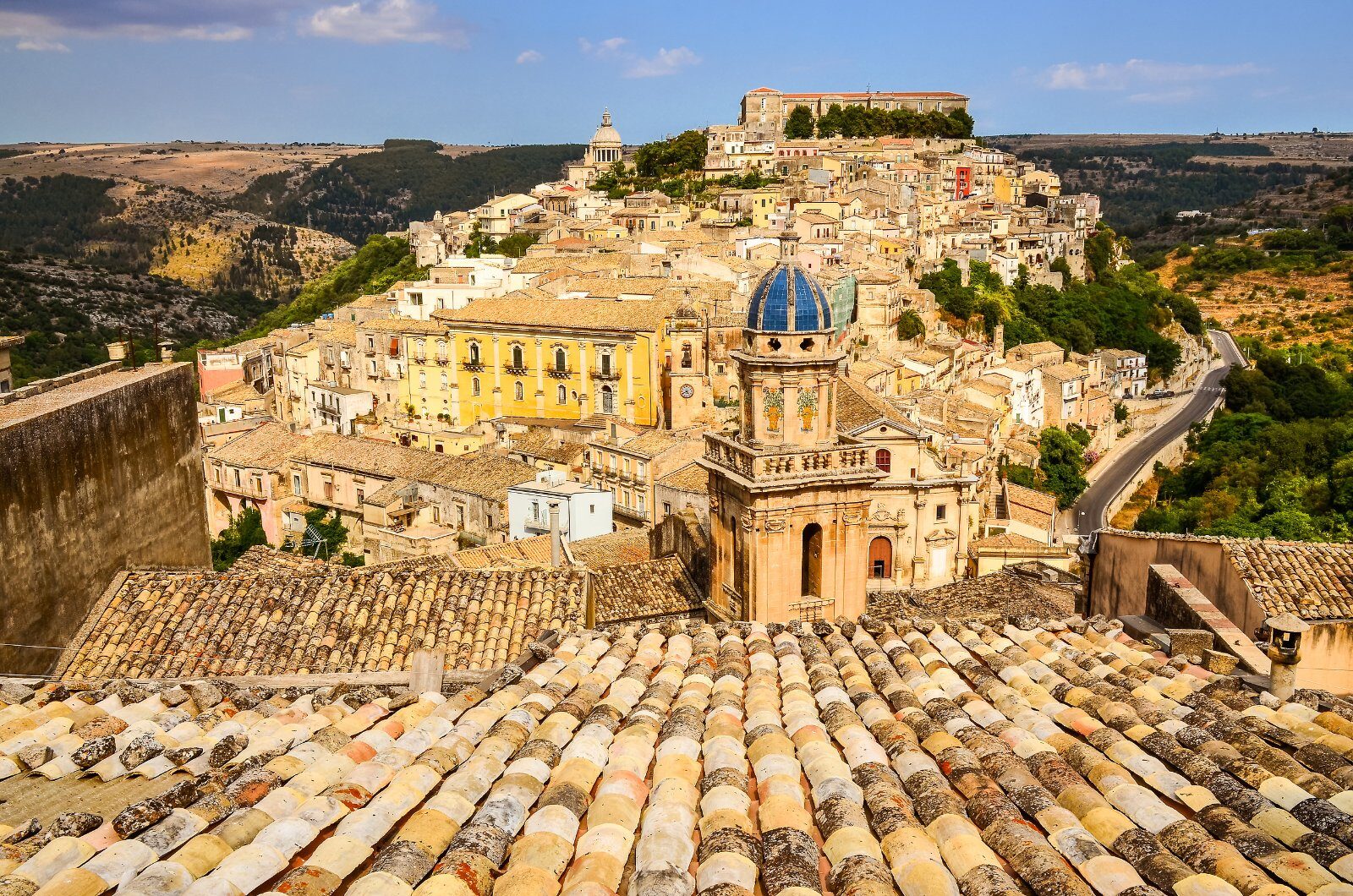 Baroque town clinging to a Sicilian hillside