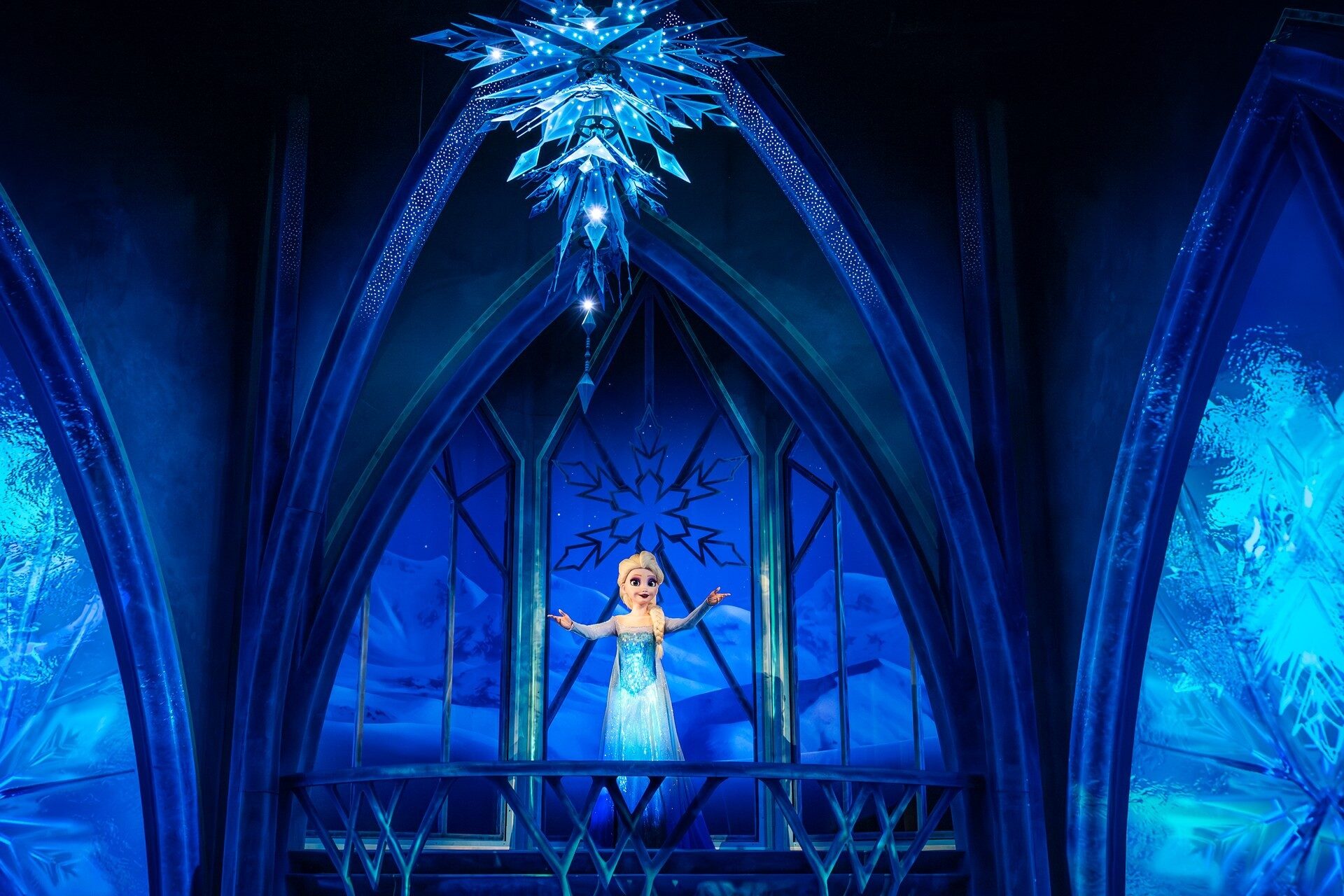 Elsa sings in her ice palace, a scene from the Frozen Ever After attraction at World of Frozen. Photo: ©Disney.