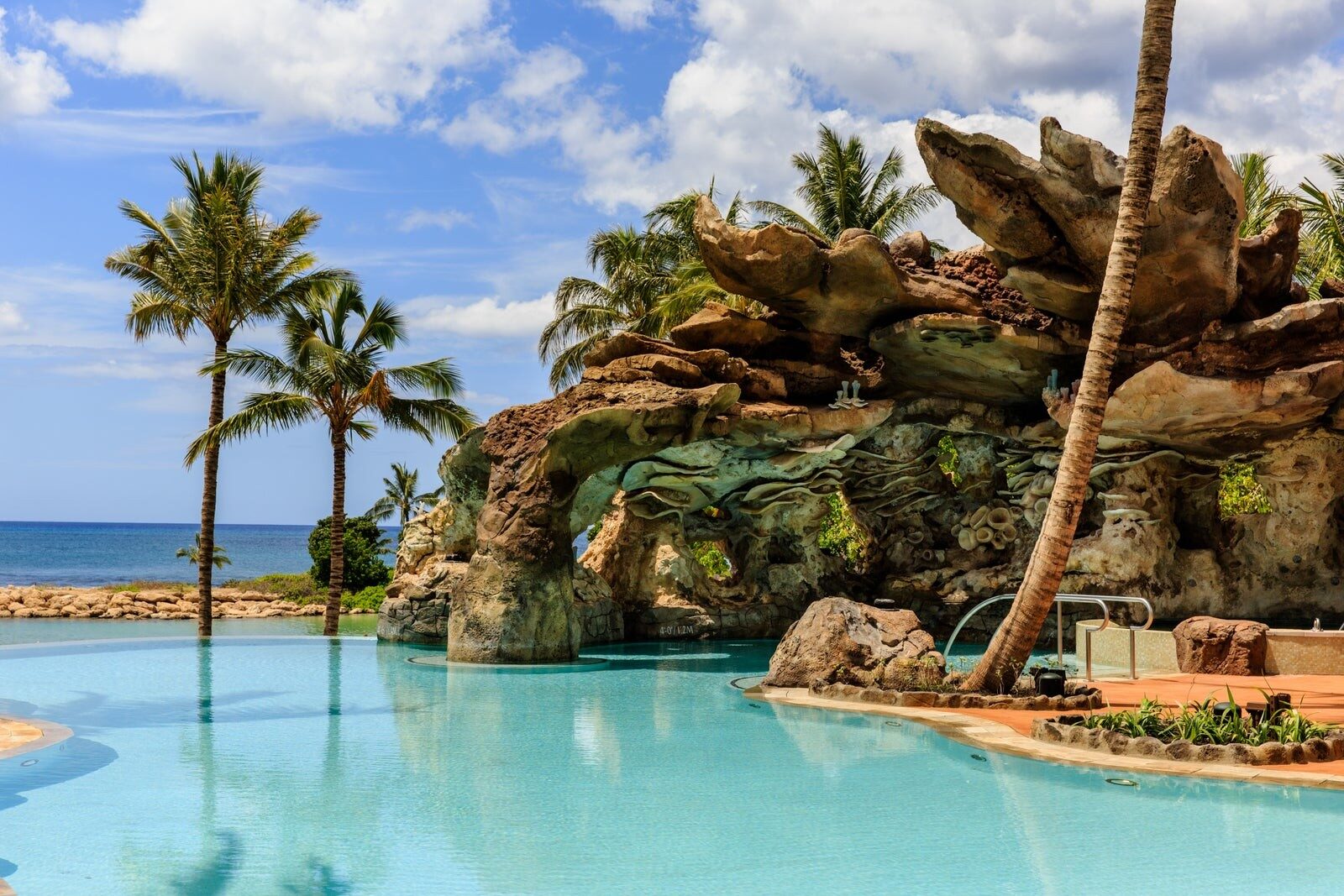 The Ka Maka Grotto infinity pool facing the ocean at Aulani