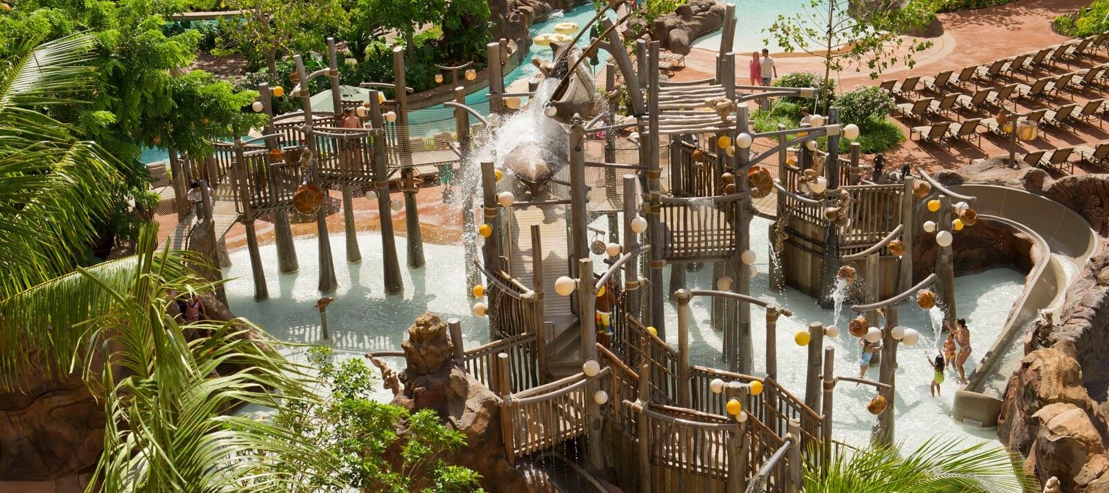 The Menehune Bridge water play area with its slides at Aulani