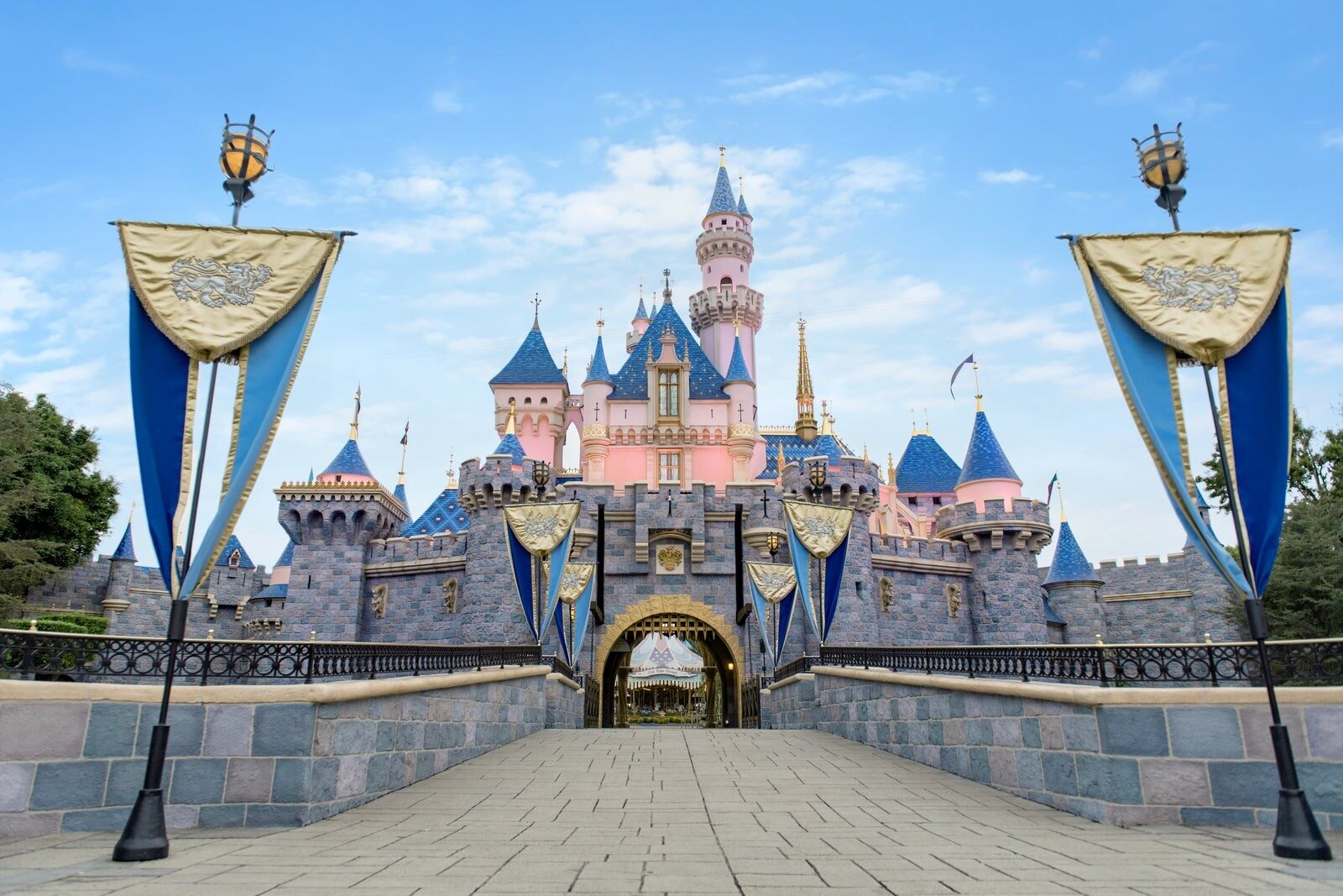 Sleeping Beauty Castle seen head-on, framed by its banners, at Disneyland Park in California Sleeping Beauty Castle seen head-on, framed by its banners, at Disneyland Park in California