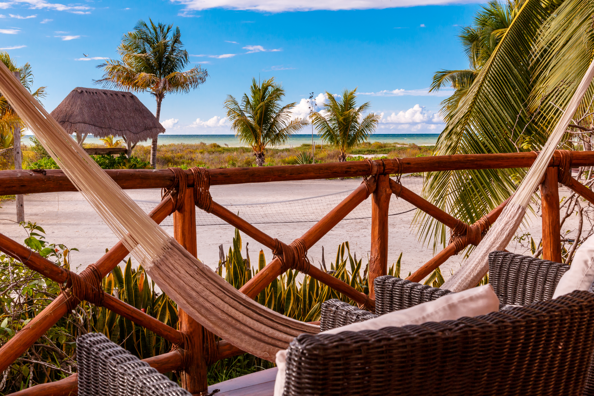 View of the beach from a balcony at Villas HM Paraiso del Mar, Isla Holbox with Aquaterra Travels View of the beach from a balcony at Villas HM Paraiso del Mar, Isla Holbox with Aquaterra Travels