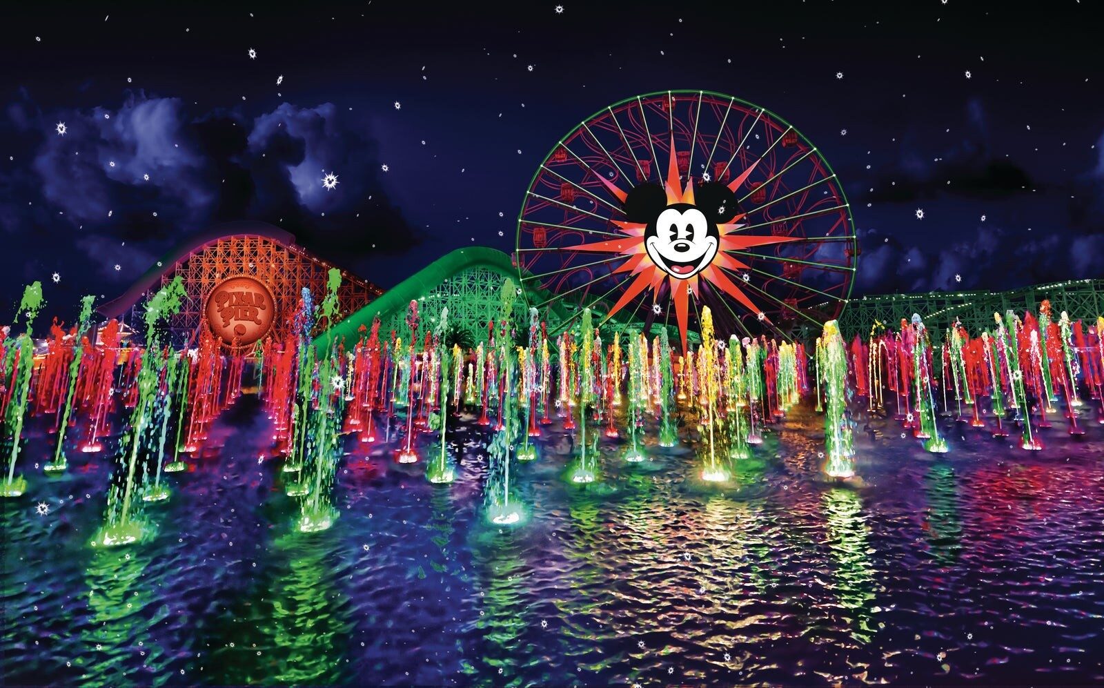 The holiday version of the World of Color show, coloured water jets in front of the wheel
